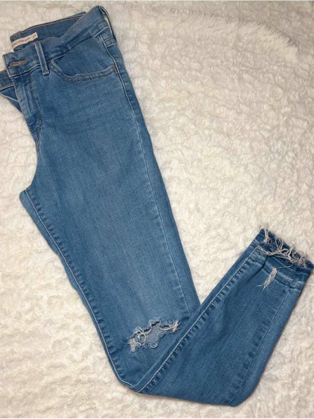 Levi's Light Blue Skinny Jeans with Distressed Hem